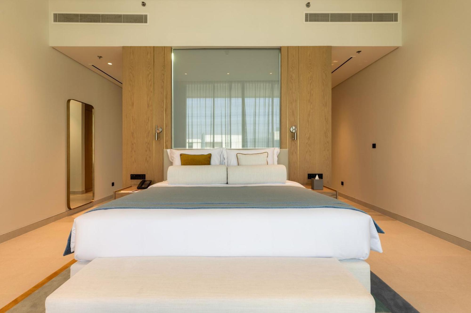 โรงแรมอัจมาน ภายนอก รูปภาพ A bedroom at the hotel