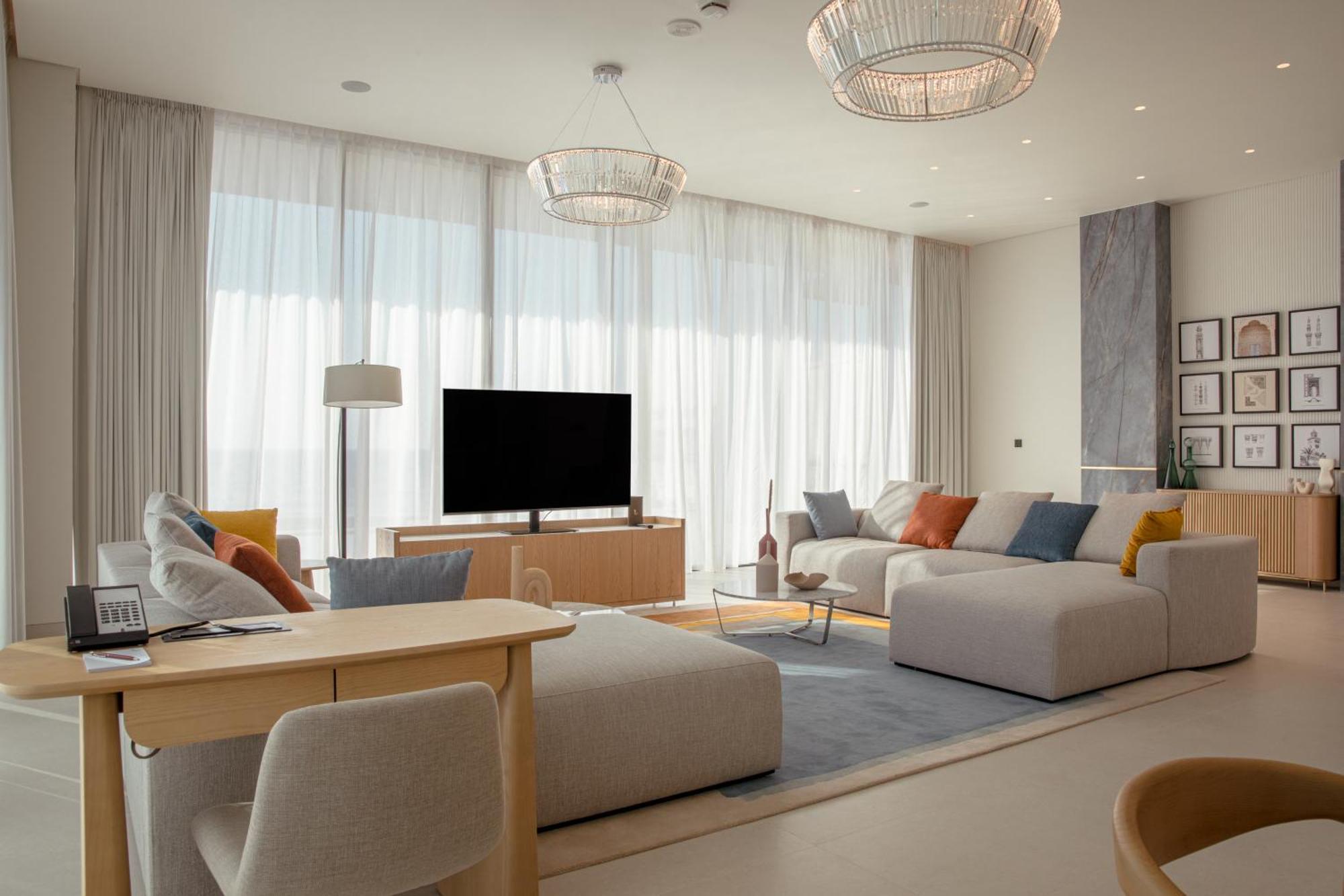 โรงแรมอัจมาน ภายนอก รูปภาพ A living room at the hotel