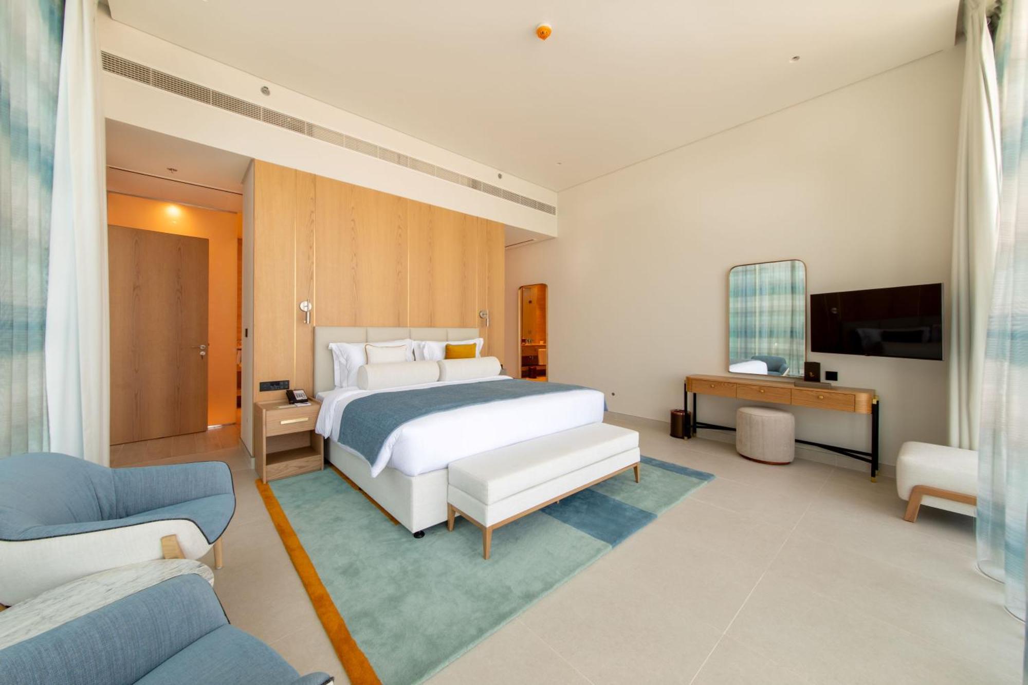 โรงแรมอัจมาน ภายนอก รูปภาพ A bedroom at the hotel
