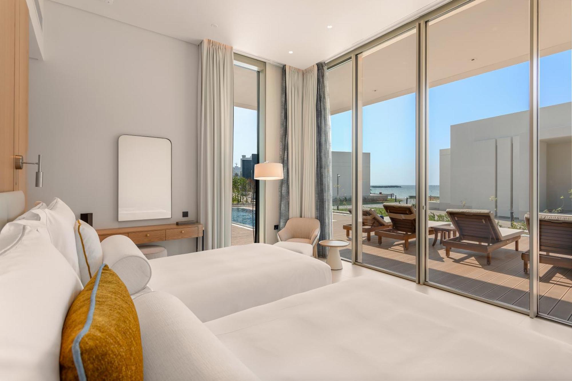 โรงแรมอัจมาน ภายนอก รูปภาพ A bedroom at the hotel