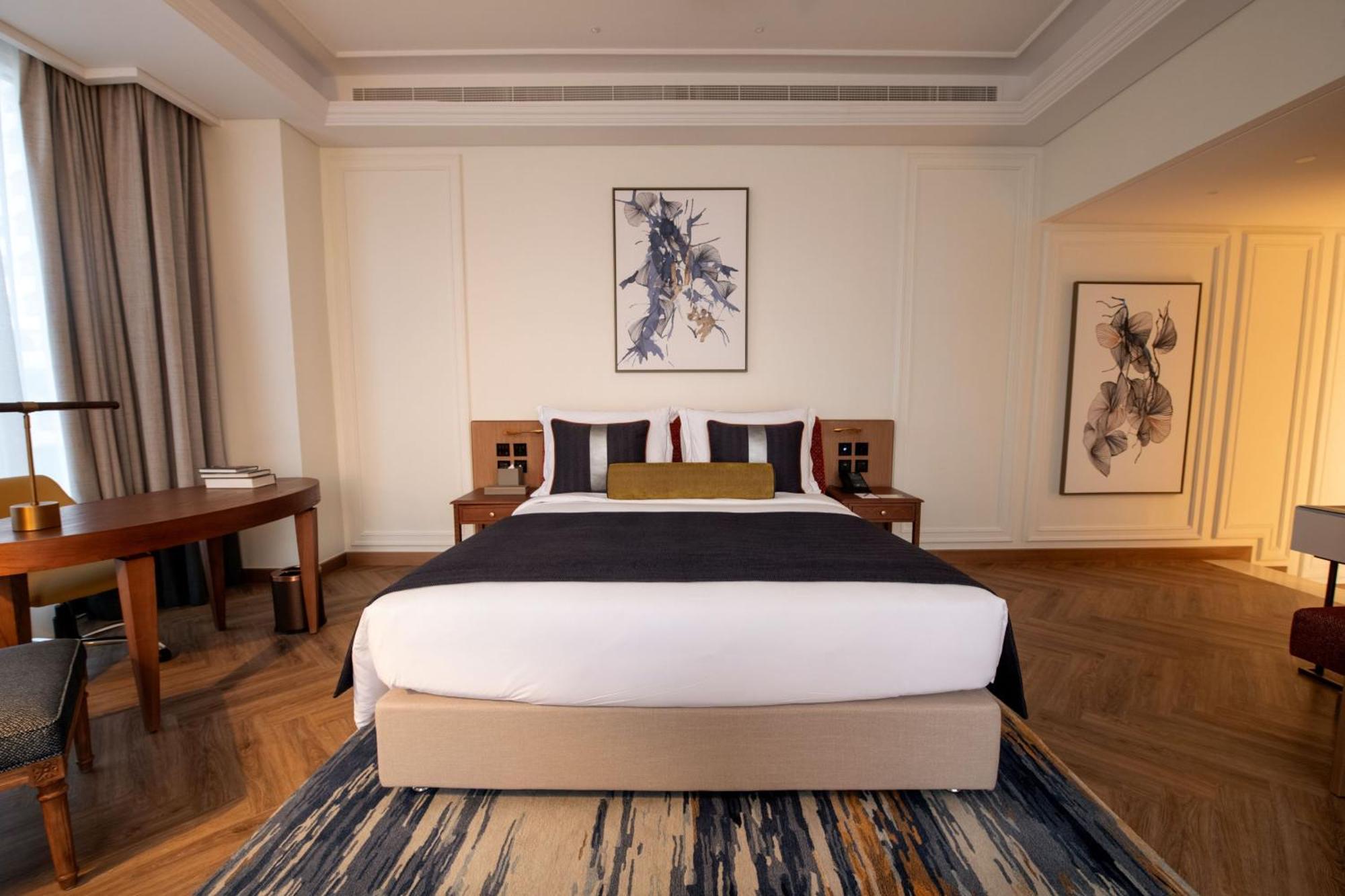 โรงแรมอัจมาน ภายนอก รูปภาพ A bedroom at the hotel
