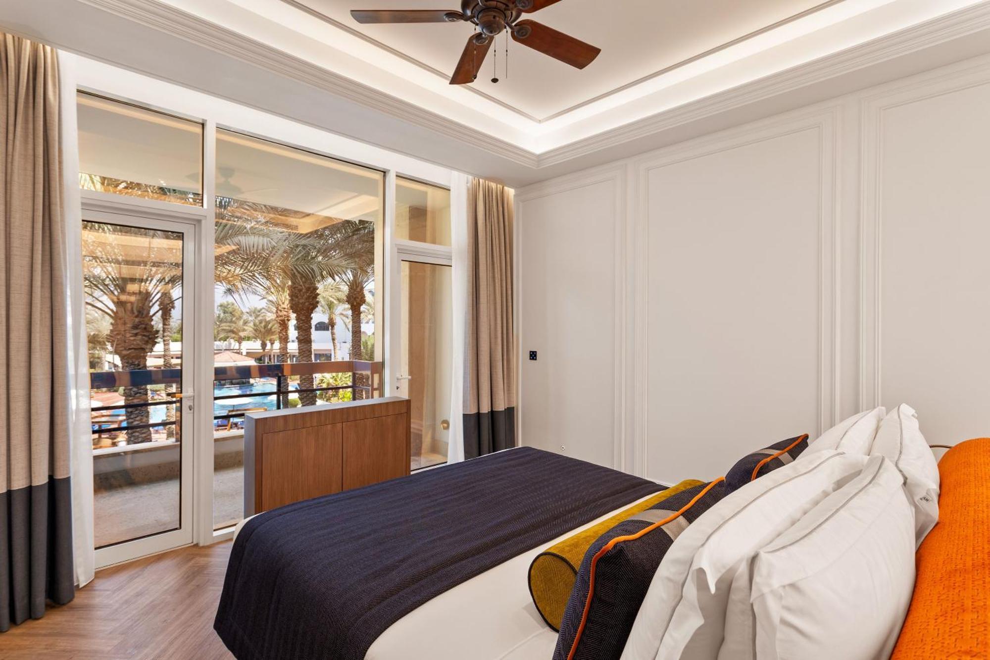 โรงแรมอัจมาน ภายนอก รูปภาพ A bedroom at the hotel