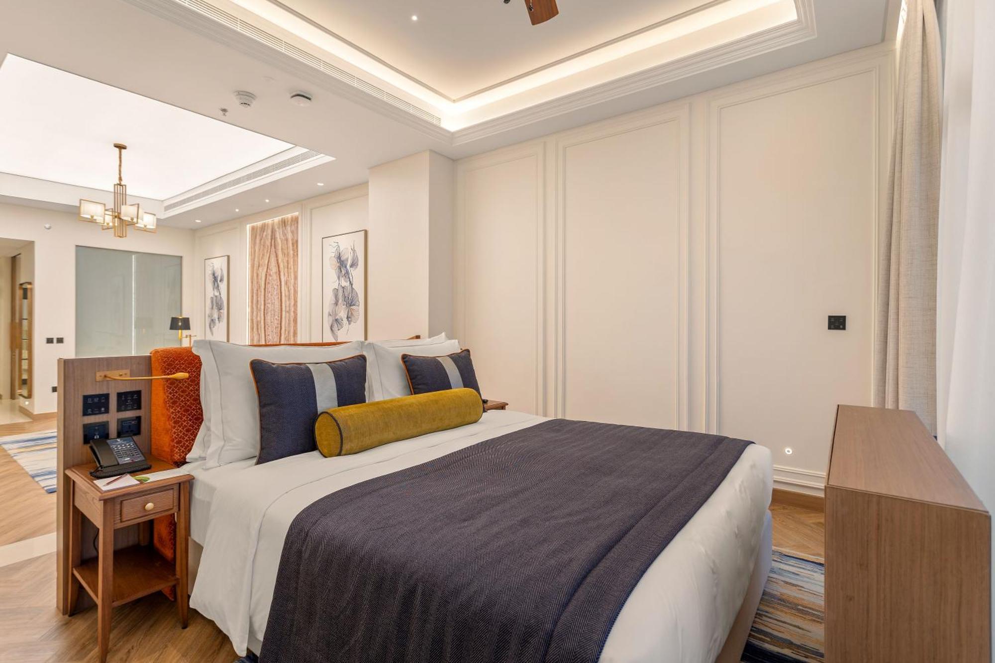 โรงแรมอัจมาน ภายนอก รูปภาพ A bedroom at the hotel
