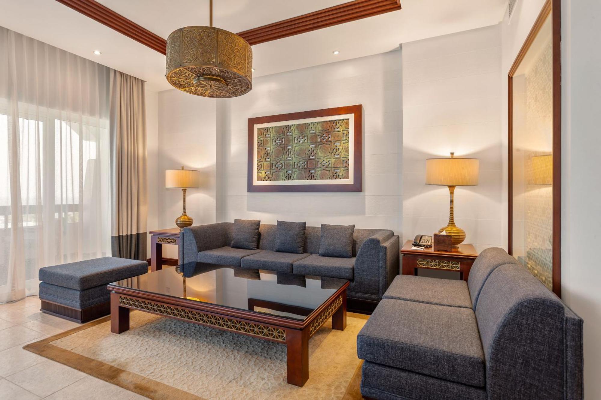 โรงแรมอัจมาน ภายนอก รูปภาพ Living room